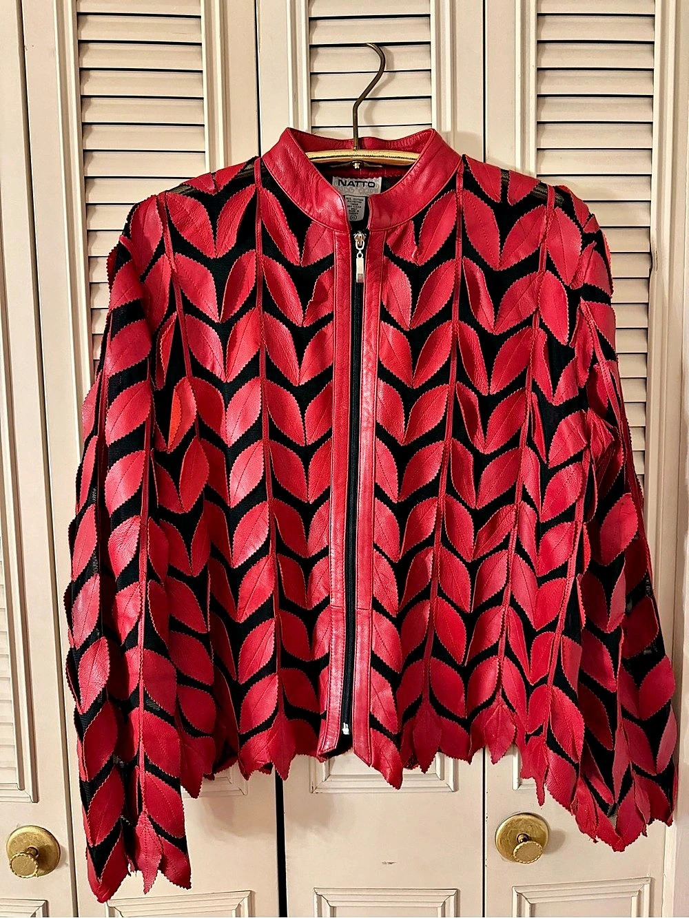 Red leather jacket leave pattern
Real leather size XL